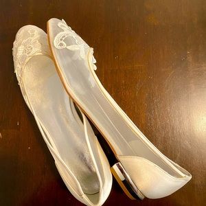 White, lacy wedding shoes w/ silver heel. Bought for my wedding, but didn’t use.